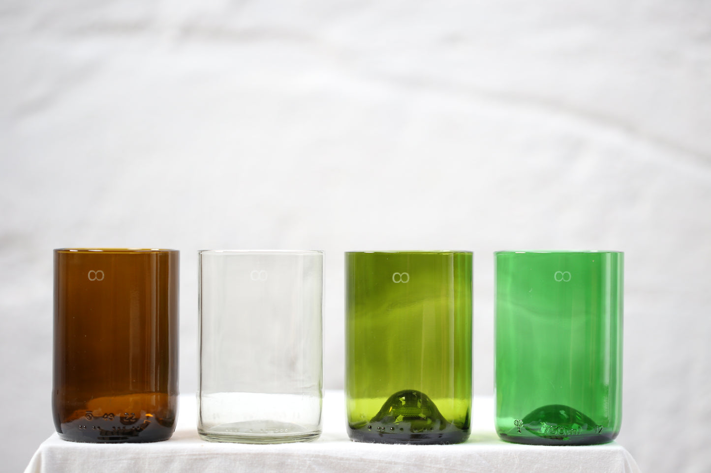 Photo of whiskey tumblers made from wine bottles.