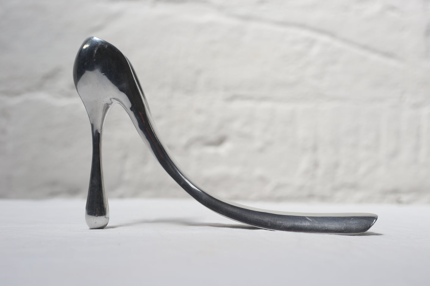 A 2004 Manola Blahnik for Habitat, limited edition shoe horn, in polished, cast aluminium