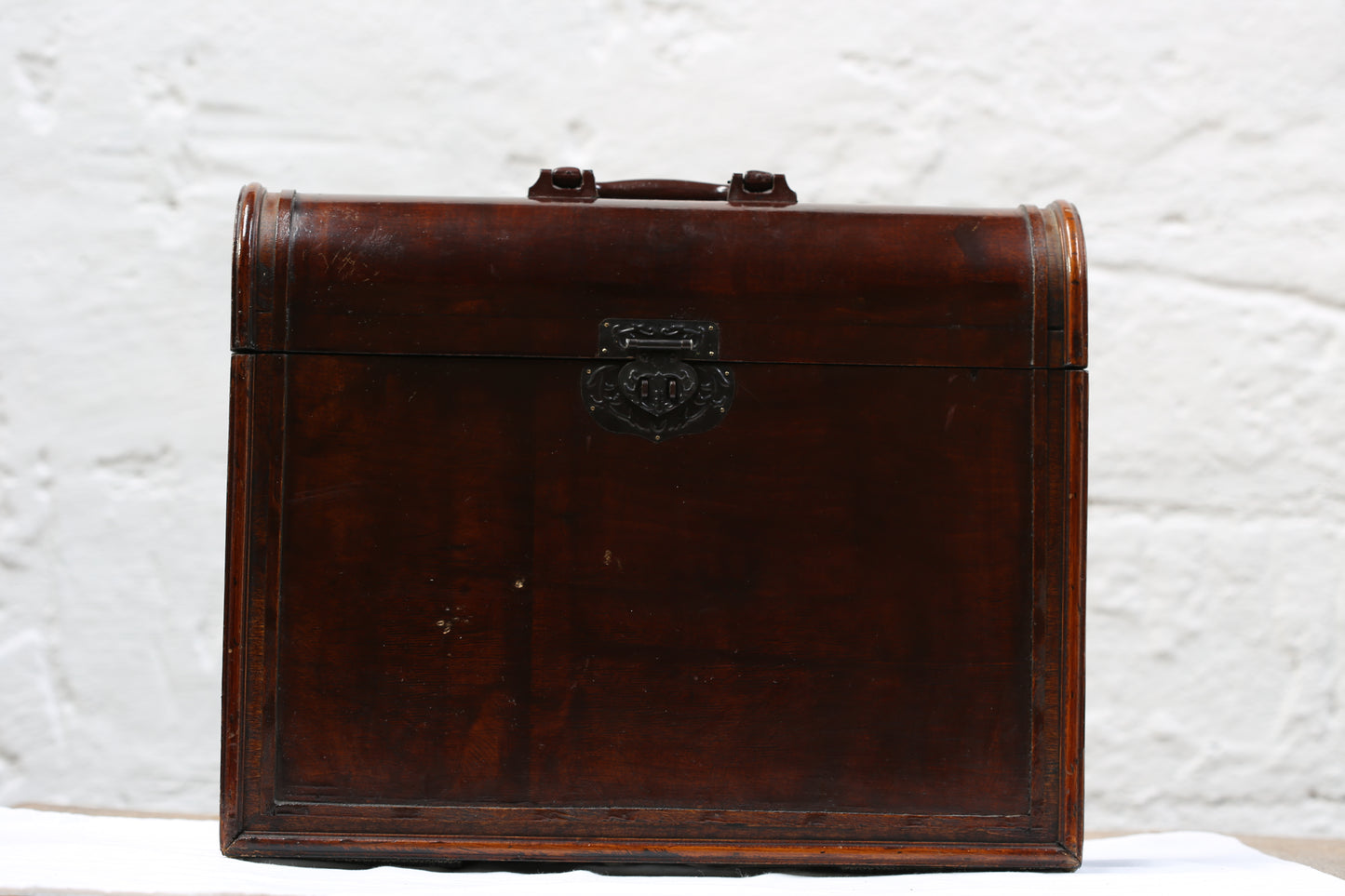 A Vintage, wooden carrying case.