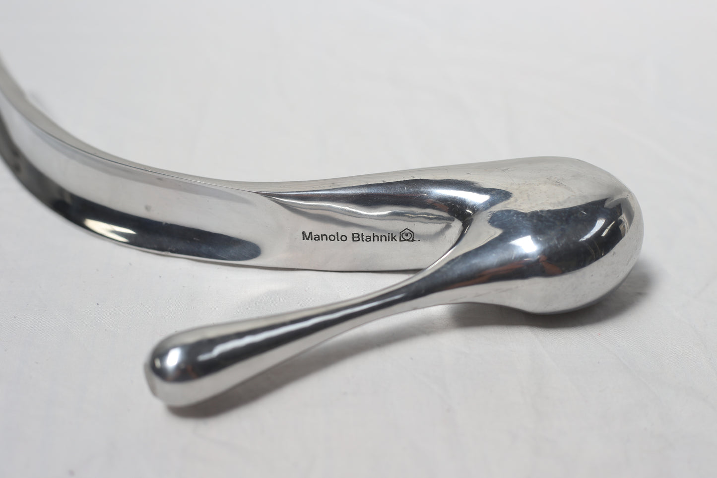 A 2004 Manola Blahnik for Habitat, limited edition shoe horn, in polished, cast aluminium