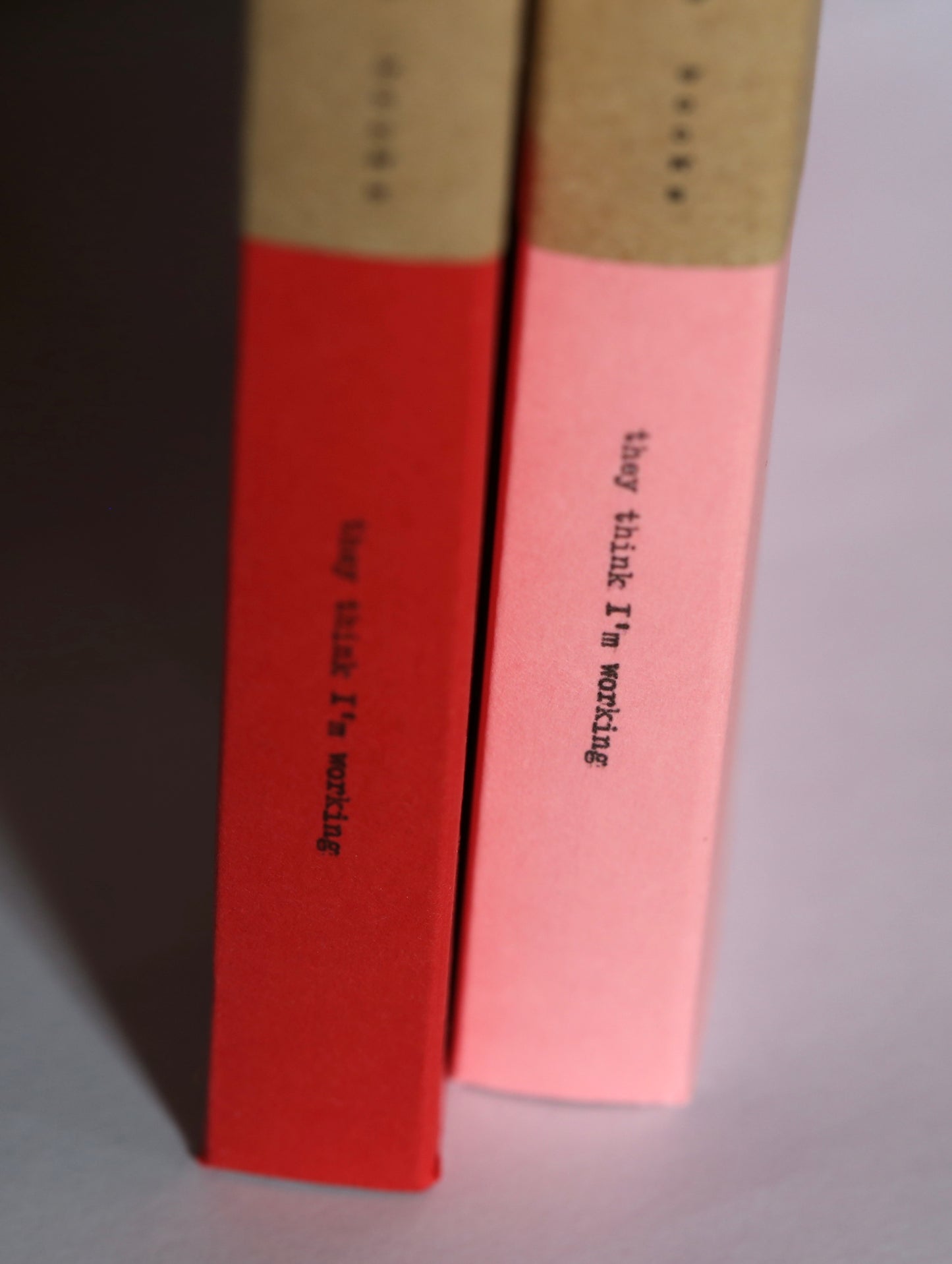 A5 112 page blank page notebook in Soft Pink and A6 84 page notebook in Idaho Red